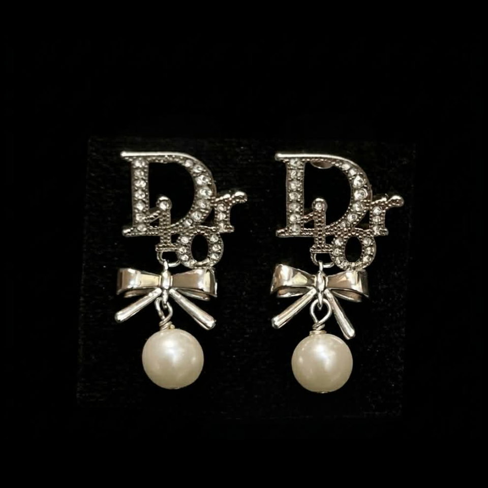 CD Letter Bow Silver Earrings – E016