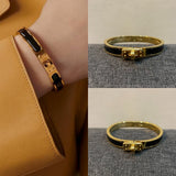 Mini Clic Kelly Bracelet Black in Gold - B001